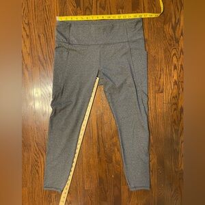 Athleta Stash Pocket Salutation Tight.  Size XL.